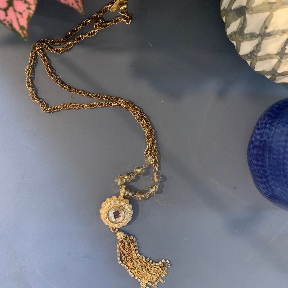 Long chained gold necklace